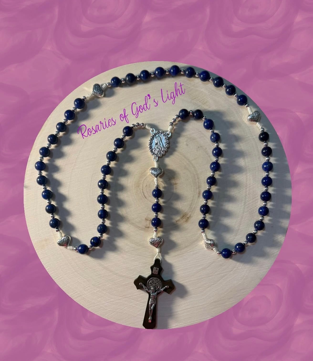 Handmade blue lapis rosary with silver heart beads and St. Benedict crucifix