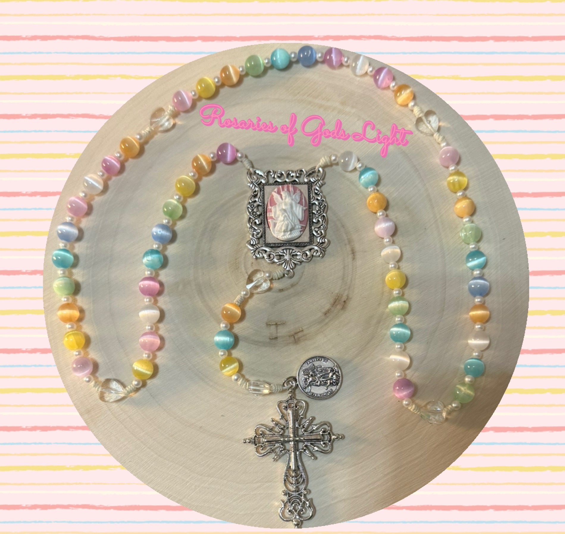 Handmade pastel rainbow rosary with St. Michael medals and ornate silver cross